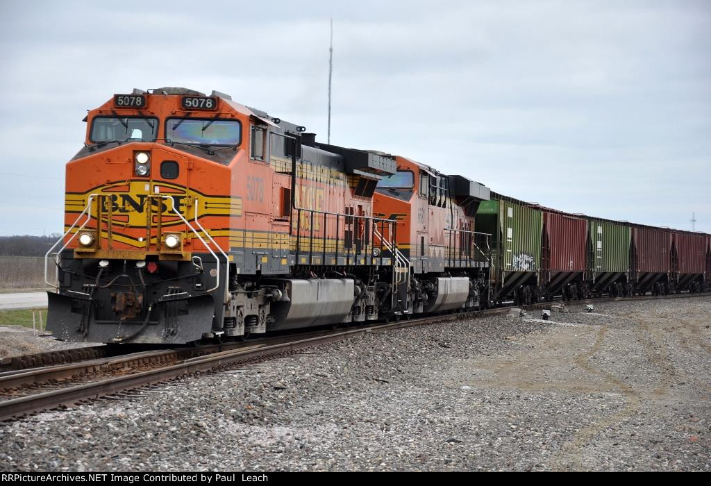 Grain train rolls east